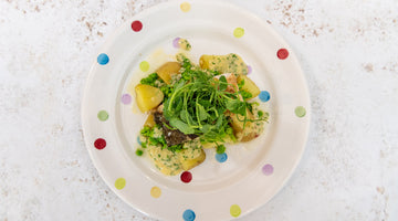 Salt Cod with peas, new potatoes and chive cream sauce